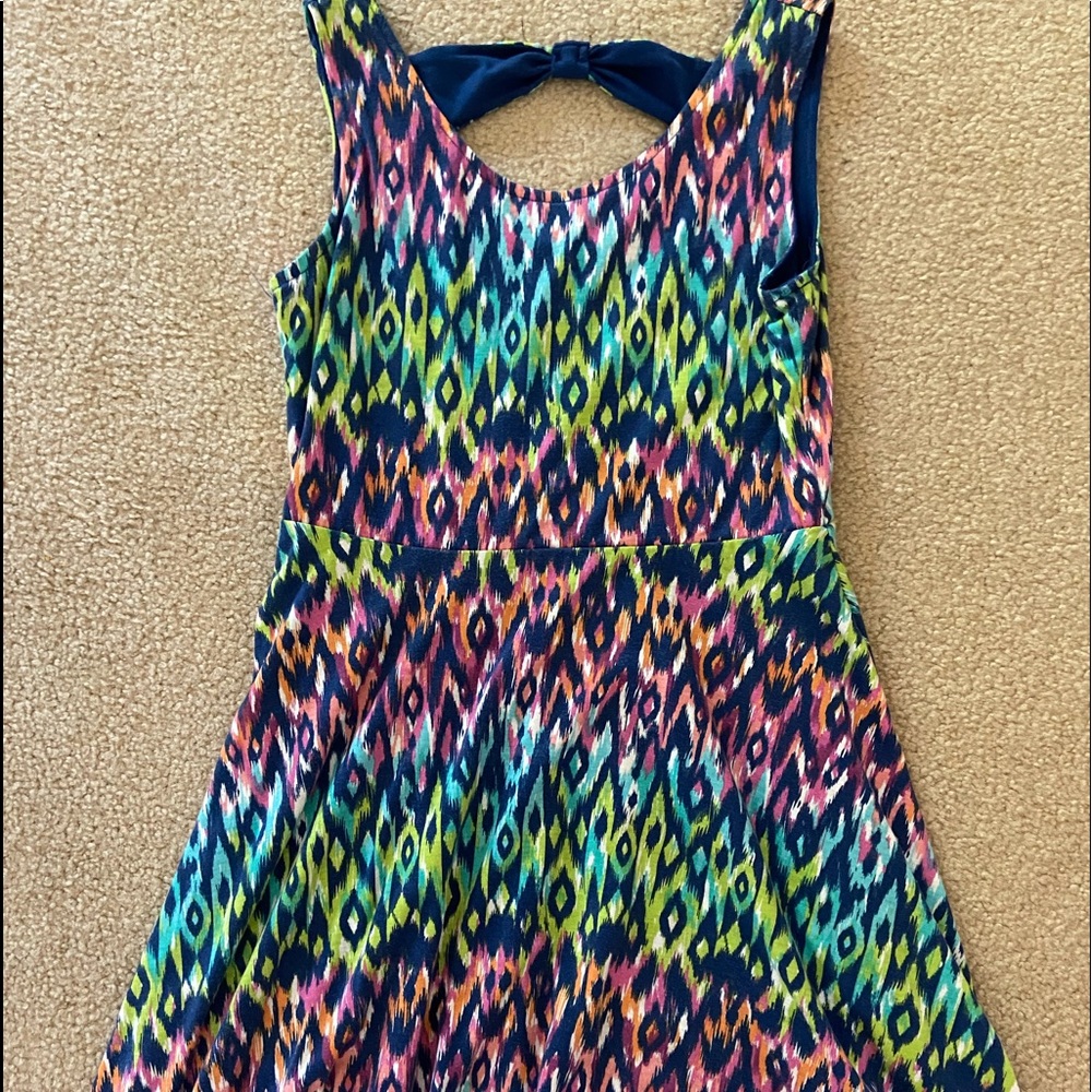 Girl’s size 12 reversible dress: 4 Ever Free